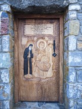 Carved wooden door of the Chapel of St. Paisios