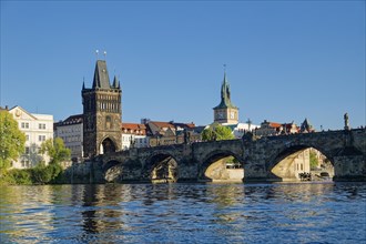 View from the Vltava River to the Old Town Bridge Tower and Charles Bridge