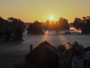 Sunrise at the edge of the village