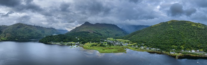 Aerial panorama of the freshwater loch Loch Leven with the village of Glen Coe