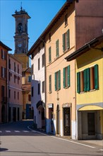 City of Porto Ceresio and Church Tower in a Sunny Summer Day in Porto Ceresio