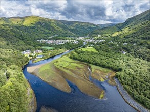 Aerial view of the village of Kinlochleven with the mouth of the River Leven at the eastern part of the freshwater loch Lochleven
