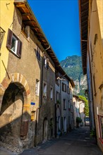 Old City Street and Mountain Peak in a Sunny Day in Riva San Vitale