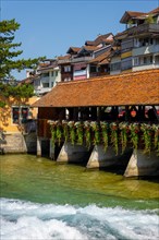 River Aare in City of Thun and Untere Schleuse Bridge in a Sunny Summer Day in Thun