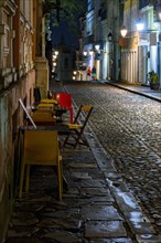Quiet Pelourinho street in Salvador city at night with the facade of old houses illuminated by lanterns