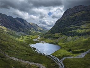 Aerial view of Glen Coe with Loch Achtriochtan and the A82 scenic road