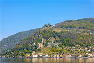 Alpine Lake Lugano with Mountain in a Sunny Day in Village Morcote