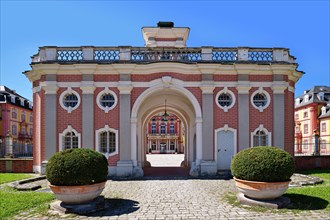 Entrance gate of Baroque castle called Bruchsal Palace in Germany on sunny day