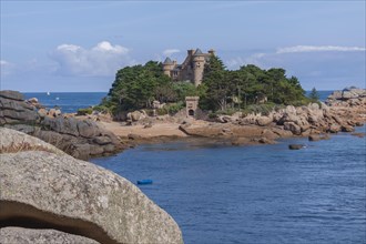 Rocky coast and Costaeres Island with Costaeres Castle