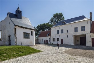 Courtyard showing chapel and gardener s house of the Chateau d'Hougoumont
