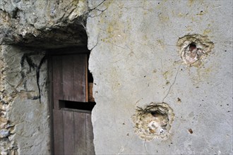 Bullet holes in one of the four British bunkers as headquarters on the Lettenberg