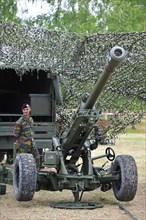 LG1 MKII 105mm Howitzer gun of the Belgian Army hidden under camouflage netting