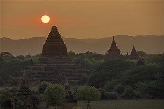 Buddhist temples and pagodas at sunset in the ancient city Bagan