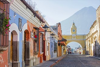 Colourful colonial houses and the 17th century Arco de Santa Catalina Arch in the city Antigua Guatemala