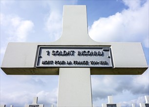 Cross on grave of unknown French soldier at First World War One military cemetery