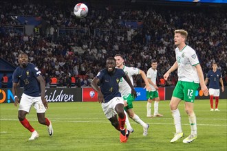 Marcus THURAM and Dayot UPAMECANO France look after the ball in a duel with Nathan COLLINS Ireland