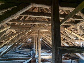 Village church roof truss made of wooden beams
