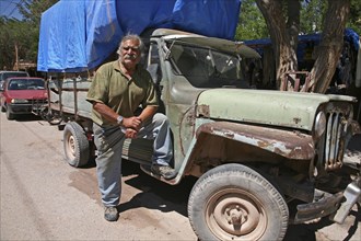 Driver and 50 year old truck in Tilcara
