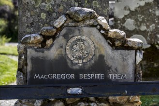 Headstone with epitaph MacGregor Despite Them on the grave of Rob Roy MacGregor at the Balquhidder kirkyard