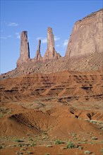 Eroded rock formation Three Sisters in the Monument Valley Navajo Tribal Park