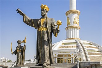 Statues of Turkmen leaders in front of the Independence Monument