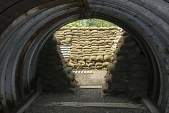 Reconstruction of British First World War One Baby Elephant shelter made of sheets of corrugated iron in trench at Zonnebeke