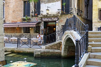 Small restaurant on a canal in Venice