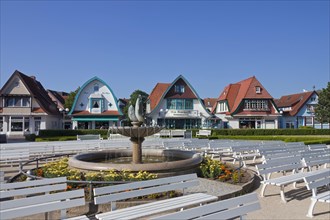 Fountain and benches in the spa garden at seaside resort Boltenhagen
