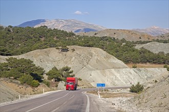 Red truck on motorway in Central Anatolia