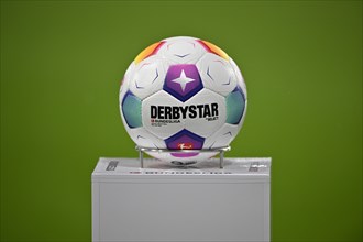 Adidas Derbystar match ball lies on pedestal