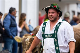Alpine herdsman in traditional traditional costume