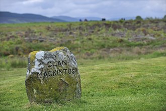 One of the headstones that mark the mass graves of fallen Jacobite soldiers at the Culloden battlefield