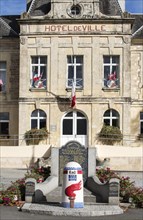 Liberty Road starting point marked by the first kilometre borne in front of the town hall of Sainte-Mere-Eglise