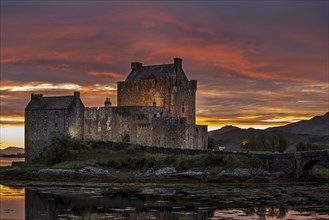 Eilean Donan Castle at sunset in Loch Duich