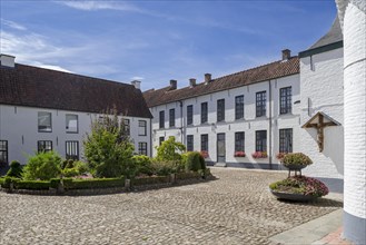 White beguines' houses in courtyard of the Beguinage of Oudenaarde
