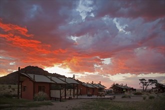 Desert Camp lodges at sunset near Sossusvlei