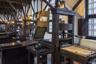 Print shop showing 18th century and 17th century printing presses in the Plantin-Moretus Museum