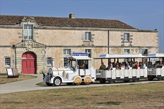 Little tourist train visiting the citadel at Le Chateau-d'Oleron on the island Ile d'Oleron