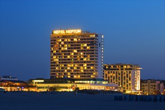 Hotel Neptun at night at seaside resort Warnemuende