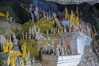 Buddha statues inside the lower cave