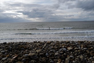 Surfers enjoy the waves along the Wild Atlantic way. Strandhill