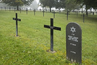 Jewish headstone amongst graves of German soldiers at the First Wolrd War One Deutscher Soldatenfriedhof Consenvoye