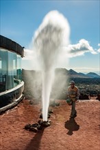 Demonstration of effect of geothermal heat by volcanism with fountain of heated boiling water