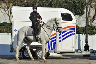 Belgian mounted police and horse trailer in Brussels