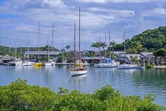 Sailing boats and yachts moored in English Harbour on the south-eastern coast of the island Antigua