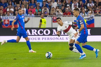 Joao CANCELO Portugal in a duel with Peter PEKARIK Slovakia re