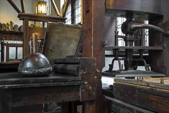 Print shop showing 18th and 17th century printing presses in the Plantin-Moretus Museum