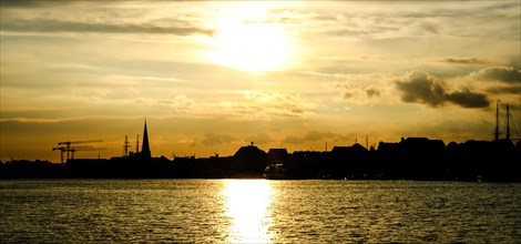 City skyline of Travemuende at sunset. Hanseatic City of Luebeck