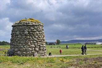 Tourists visiting the moor with its memorial cairn and visitor centre at the Culloden battlefield