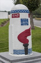Last stone marker of the Route of Liberty near the World War Two Mardasson Monument at Bastogne in the Belgian Ardennes